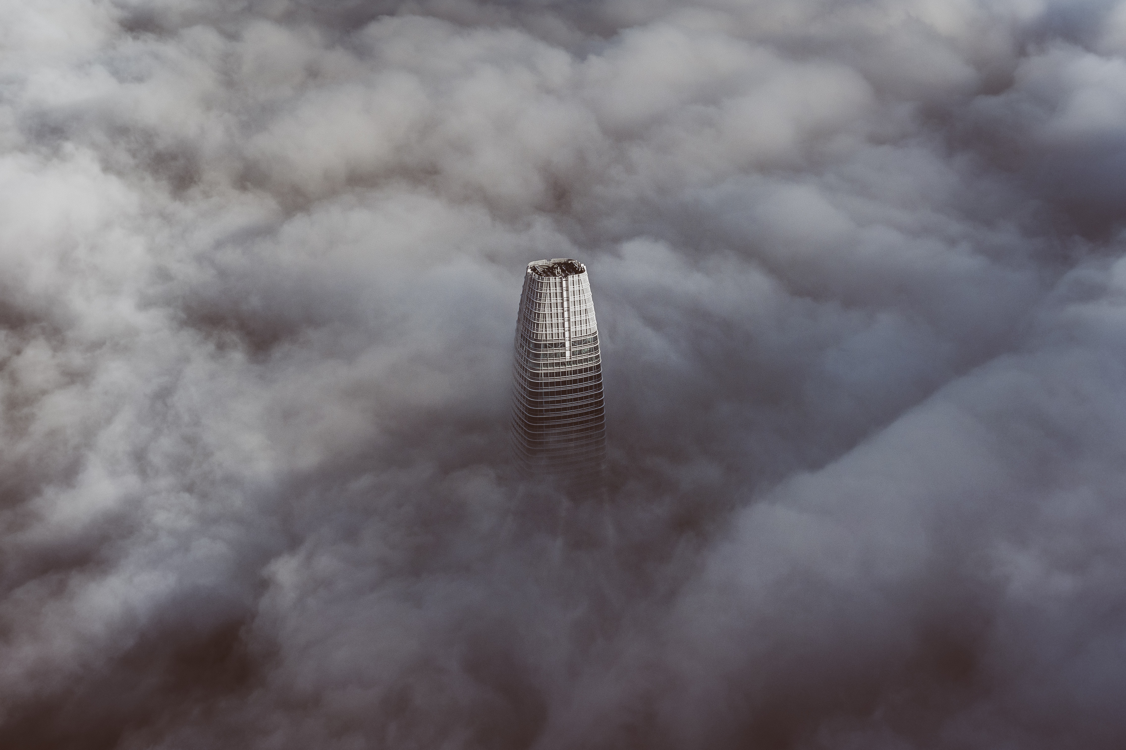 Salesforce Tower Rising up Throught the Clouds